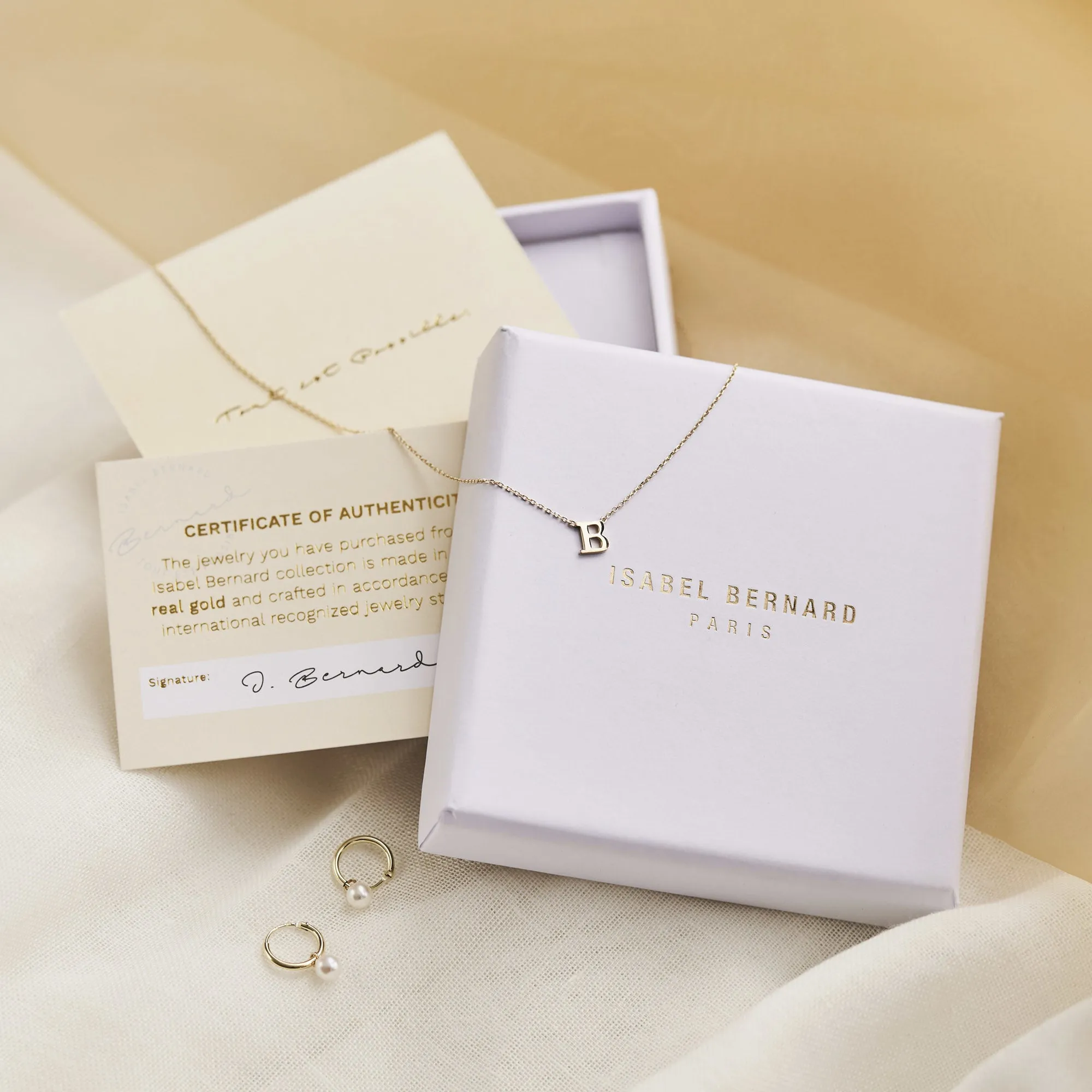 La Concorde Juliette 14 karat rose gold ear studs with zirconia stone